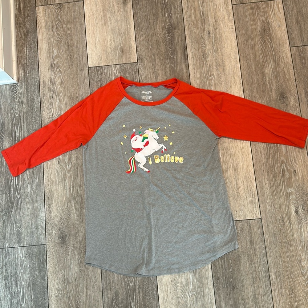 I believe Santa T shirt